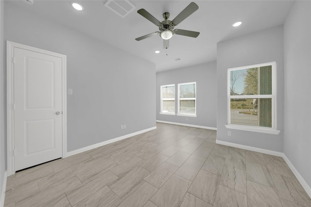 spare room featuring ceiling fan