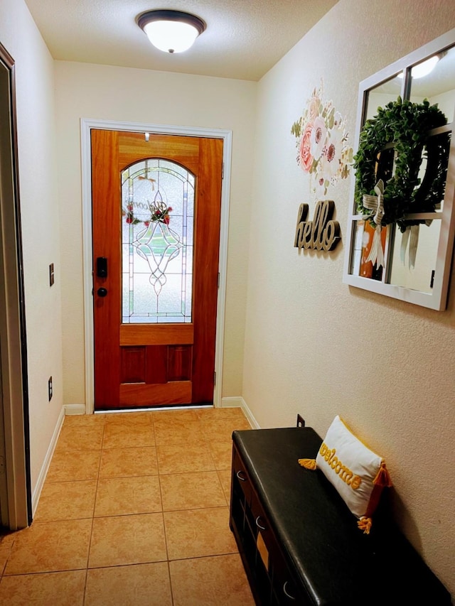 foyer with light tile patterned floors