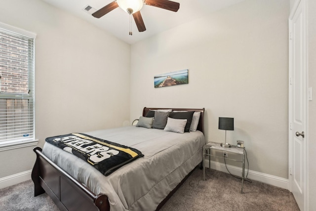 carpeted bedroom featuring ceiling fan