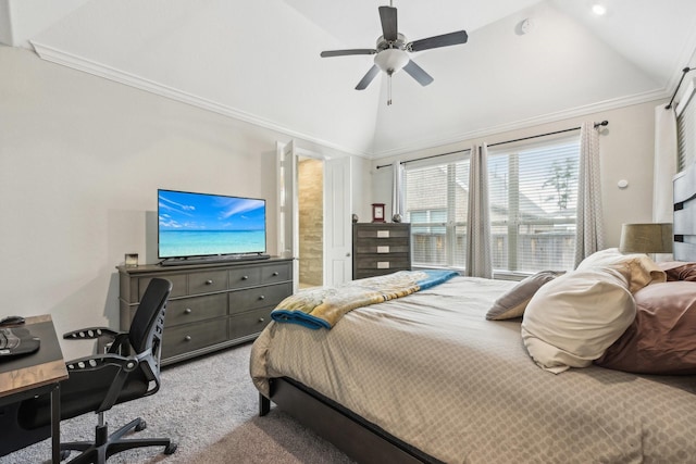 carpeted bedroom featuring ceiling fan, crown molding, and vaulted ceiling