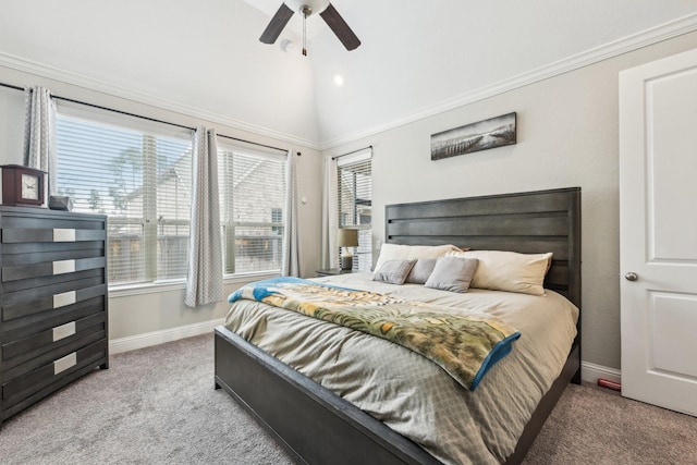 carpeted bedroom with ceiling fan, ornamental molding, and lofted ceiling