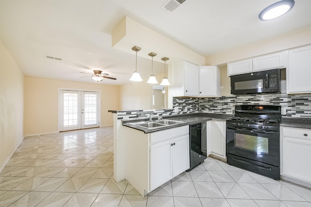 kitchen featuring french doors, white cabinets, and black appliances