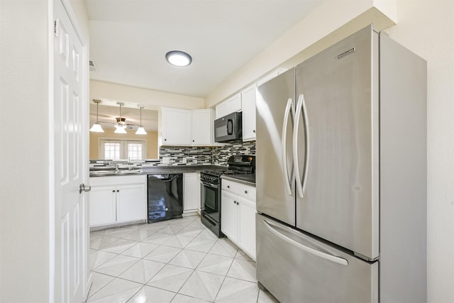 kitchen with black appliances, ceiling fan, white cabinetry, and tasteful backsplash