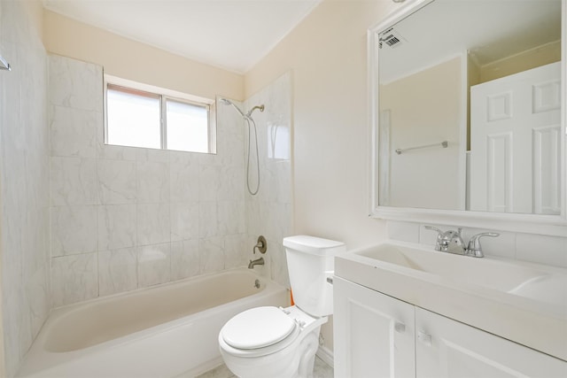 full bathroom with vanity, toilet, and tiled shower / bath combo