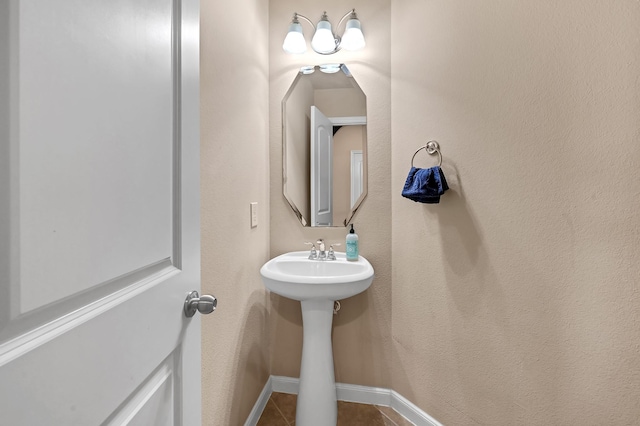 bathroom featuring tile patterned floors and sink