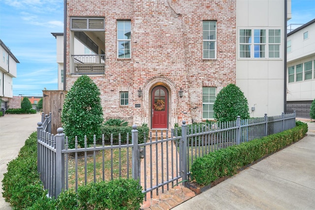 view of front of home with a balcony