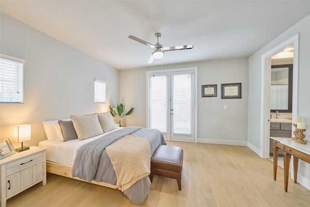 bedroom featuring ceiling fan, ensuite bathroom, access to exterior, and light wood-type flooring