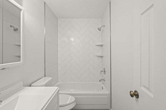 full bathroom with vanity, toilet, a textured ceiling, and tiled shower / bath combo