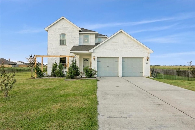 view of front facade featuring a front yard and a garage