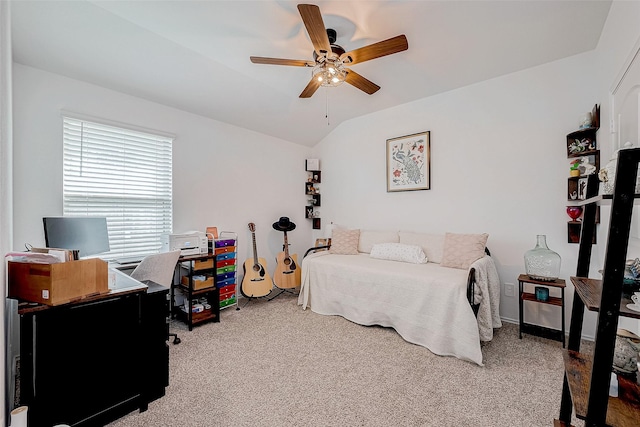 bedroom with vaulted ceiling, ceiling fan, and carpet flooring