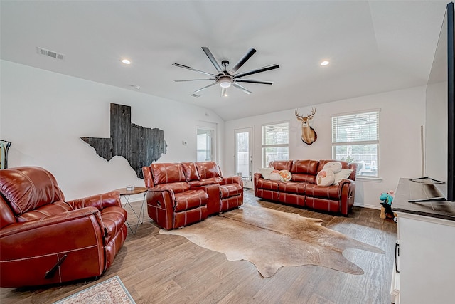 living room with ceiling fan and wood-type flooring