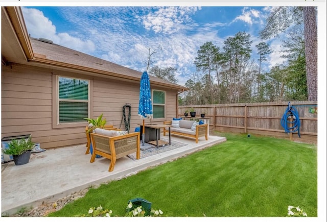 view of yard with a patio area and outdoor lounge area