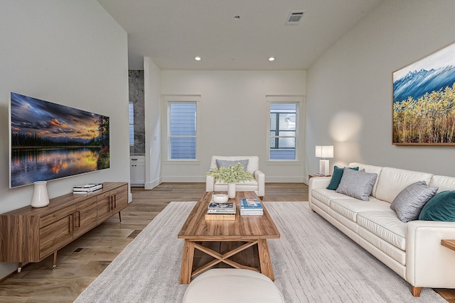 living room with light hardwood / wood-style floors