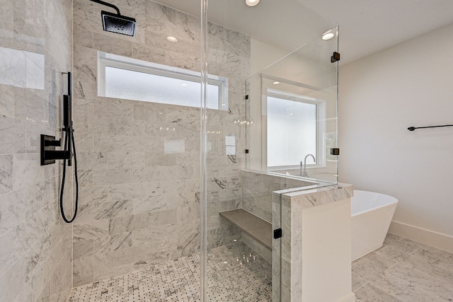 bathroom with shower with separate bathtub