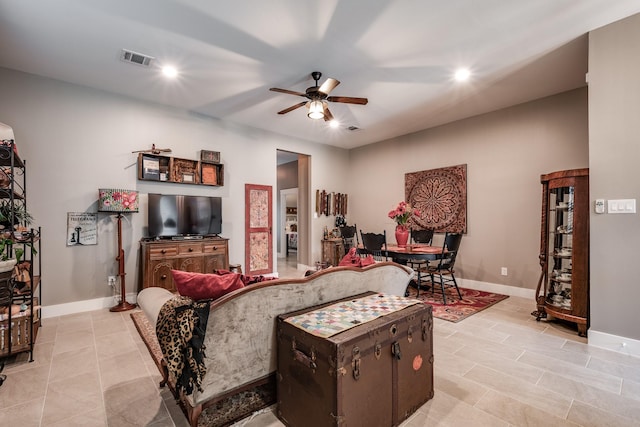 living room with ceiling fan