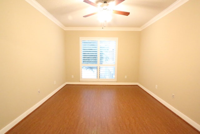 empty room with hardwood / wood-style floors, ceiling fan, and crown molding