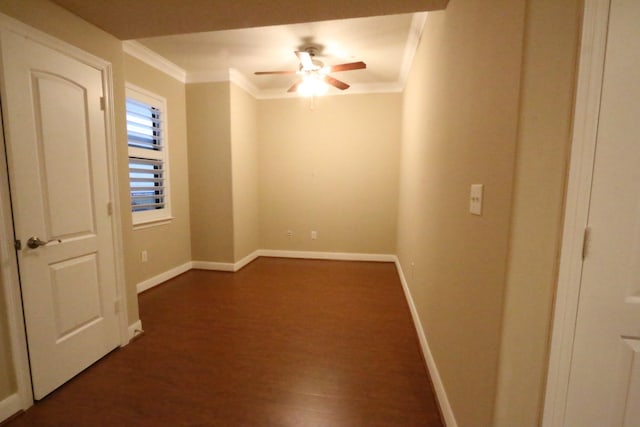 unfurnished room featuring dark hardwood / wood-style floors, ceiling fan, and ornamental molding