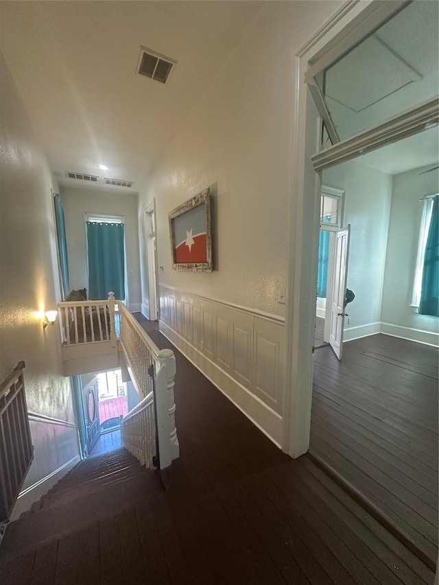 hall featuring dark wood-type flooring