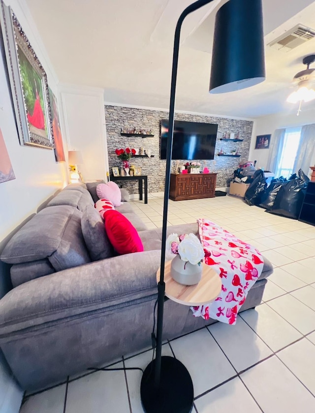 living room with tile patterned flooring and ceiling fan