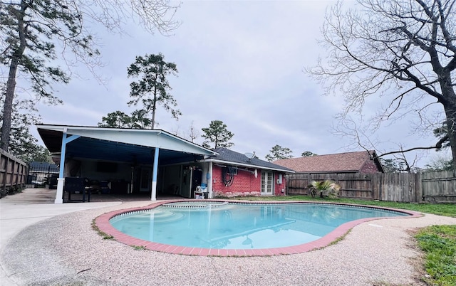 view of pool with a patio, a fenced backyard, and a fenced in pool