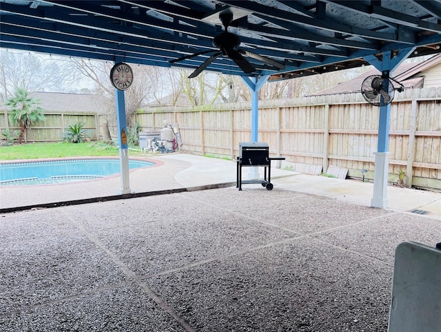 exterior space with a fenced in pool and a fenced backyard