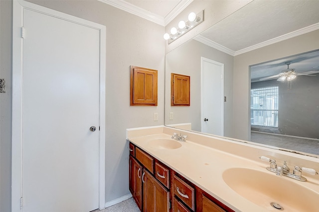 full bathroom with double vanity, crown molding, ceiling fan, and a sink