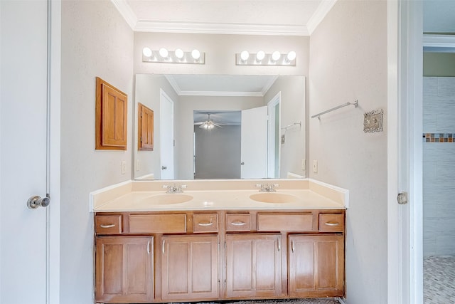 bathroom featuring ceiling fan, ornamental molding, a shower, and vanity