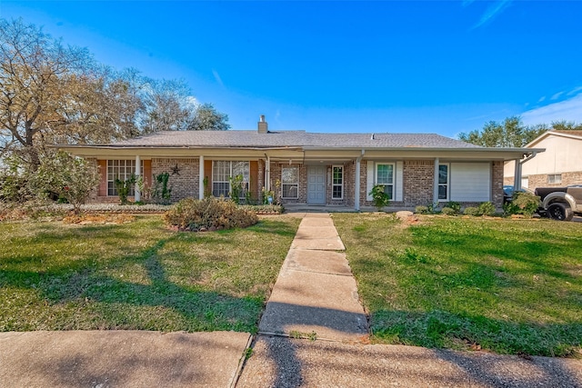 single story home with a front lawn, brick siding, and covered porch