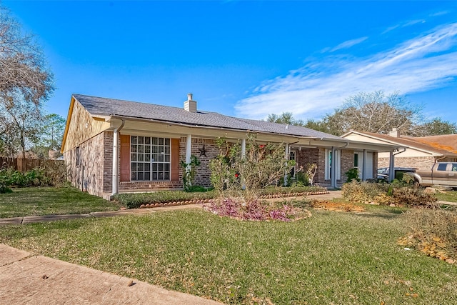 ranch-style house with a front yard, brick siding, a chimney, and fence