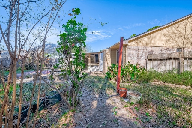 view of yard with a lanai