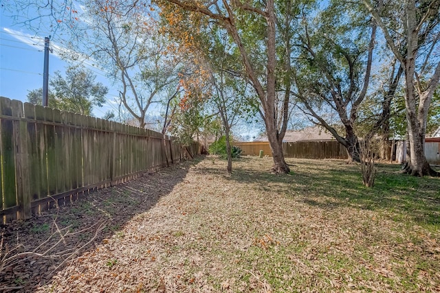 view of yard featuring a fenced backyard