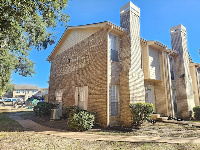 view of home's exterior featuring cooling unit