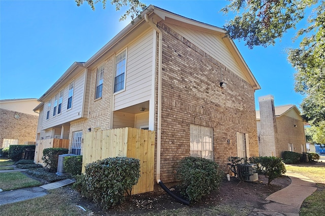 view of property exterior with cooling unit