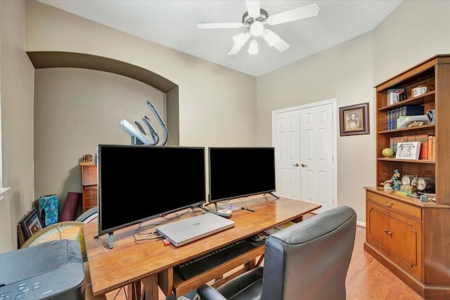 home office featuring ceiling fan and light wood-type flooring