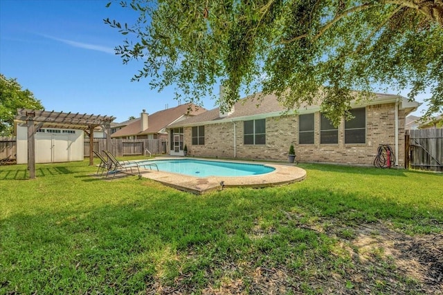 back of house featuring a fenced in pool, a pergola, and a yard