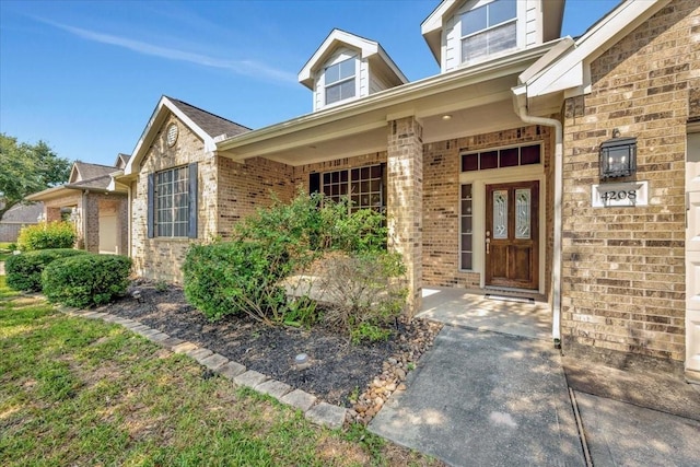 entrance to property with covered porch