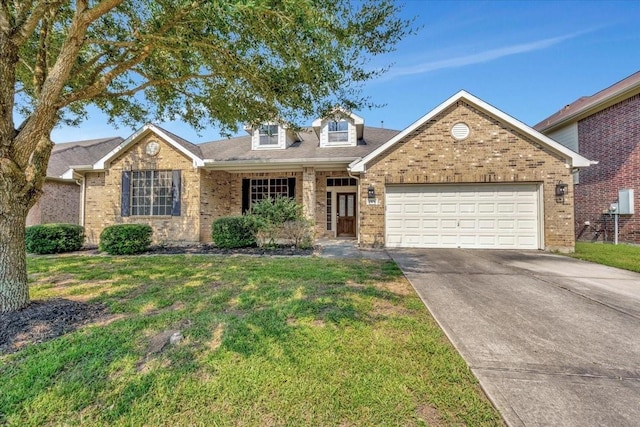 view of front facade featuring a front yard and a garage