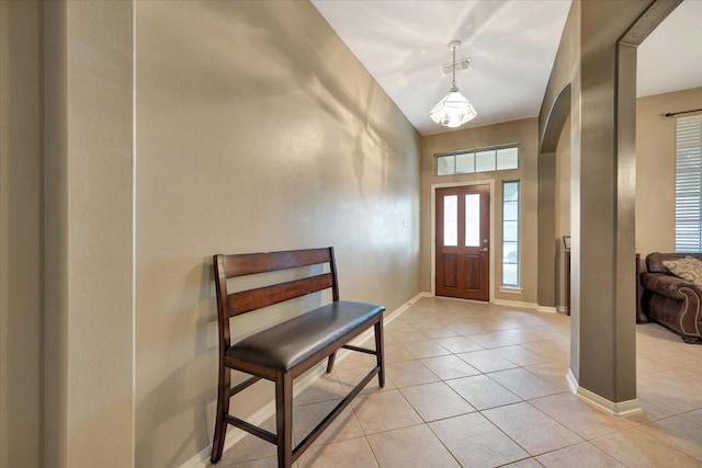 foyer with light tile patterned floors