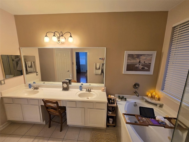 bathroom with tile patterned floors, vanity, and a relaxing tiled tub