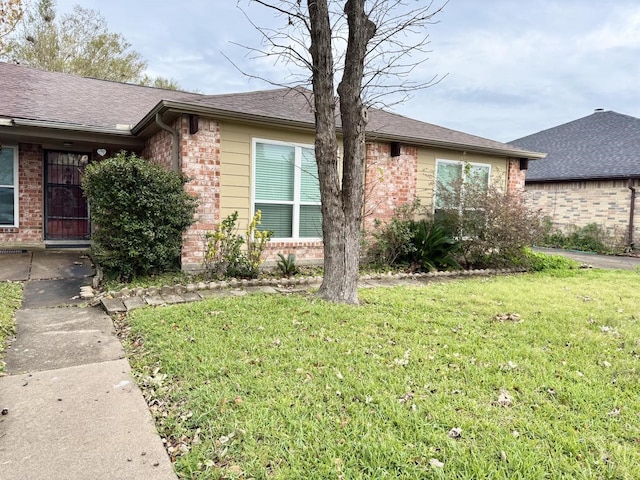 view of property exterior with a yard