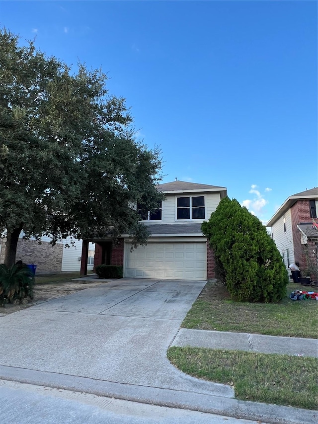 view of front of property with a garage