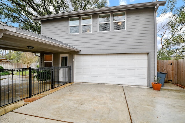 view of front of home with a garage