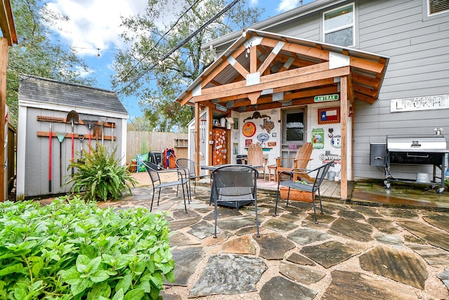 view of patio / terrace with a shed