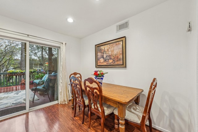 dining area with hardwood / wood-style flooring