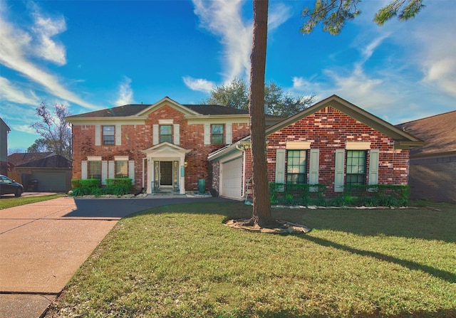 view of front of property with a front yard and a garage