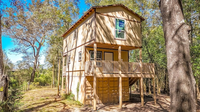 exterior space featuring a wooden deck