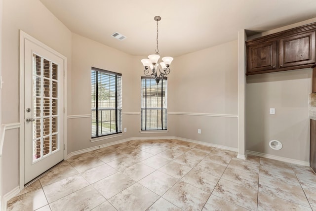 unfurnished dining area featuring light tile patterned flooring and a notable chandelier