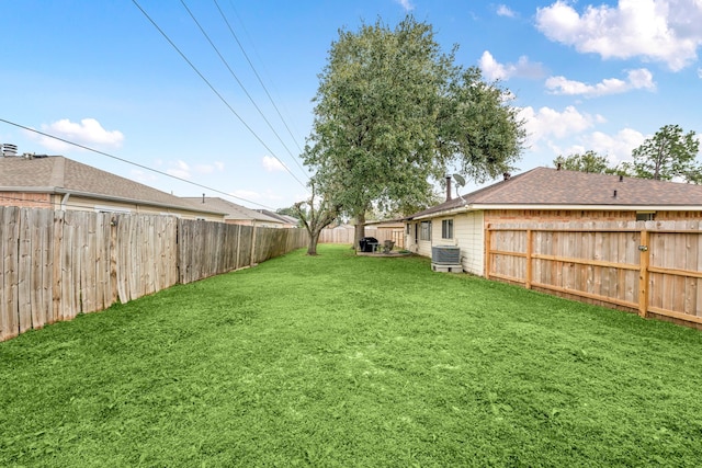 view of yard with central AC