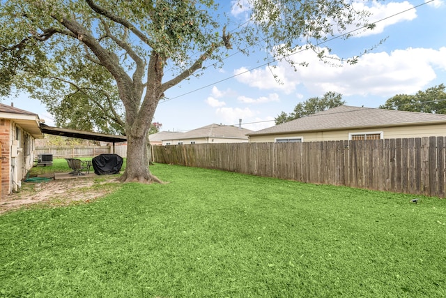 view of yard with central AC