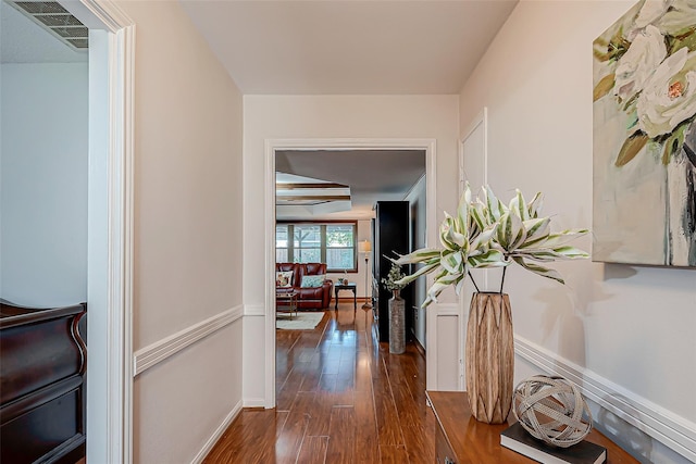 hallway featuring dark hardwood / wood-style floors